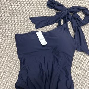One shoulder navy swimsuit. NWT. Size 6